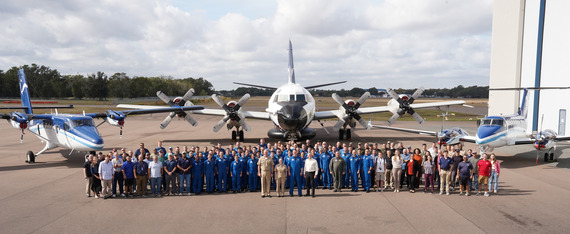 Aircraft Operations Center Staff in front of NOAA P-3