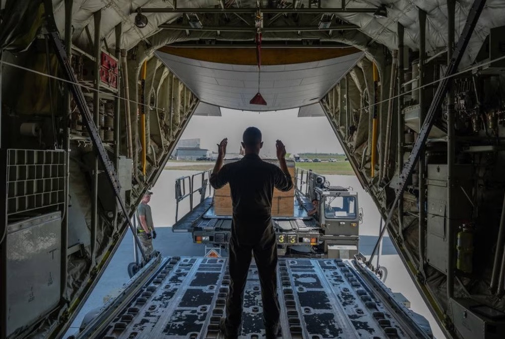 cargo is loaded onto a C-130J 