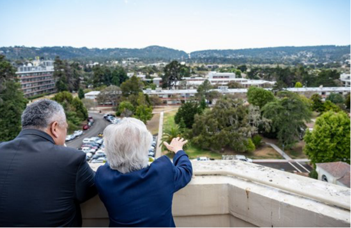  Secretary of the Navy Carlos Del Toro is given a tour of the NPS grounds by retired Vice Adm. Ann Rondeau.