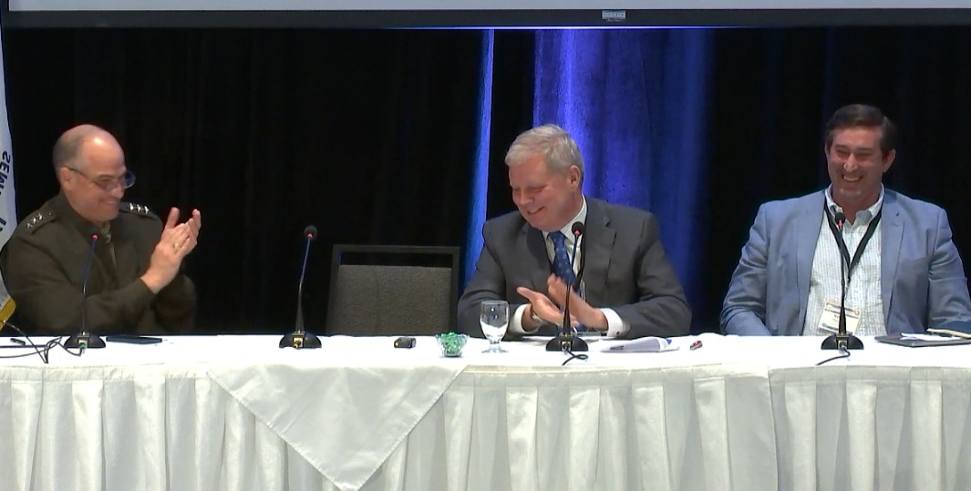 Members of panel 9 share the stage