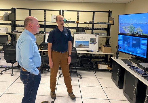 Dr. Kevin Smith receives a tour of the Coast Guard Research and Development Center