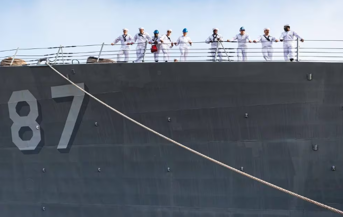 The crew of the U.S. Navy destroyer Mason