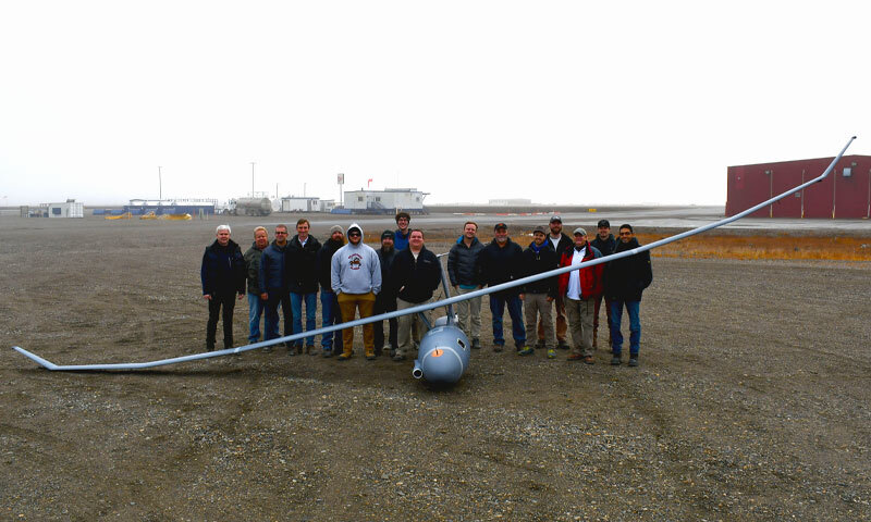 researchers with a glider UAV