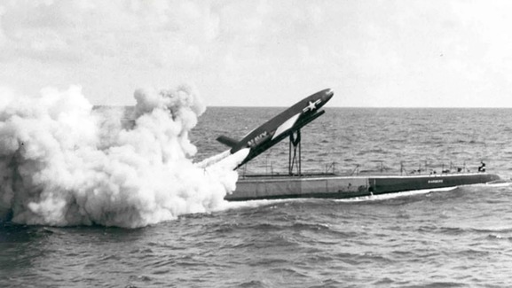 b&w photo of a missile being launched from a sub