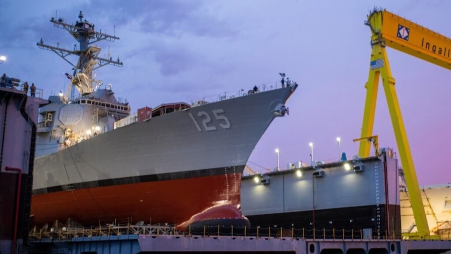 Prow of a ship with cranes in foreground