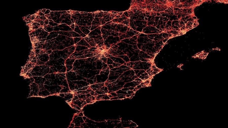 orange cellular network superimposed on satellite image of Spain