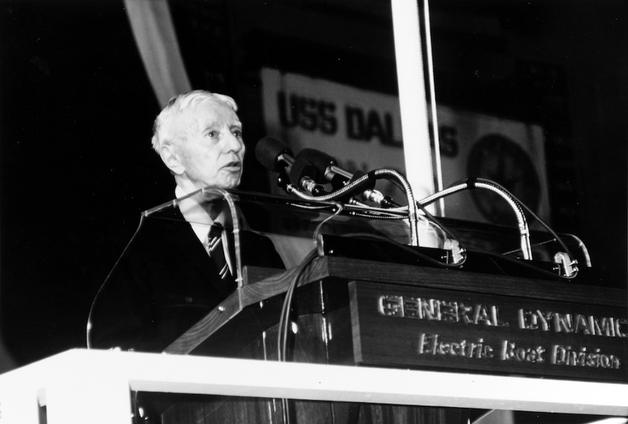 rickover speaking at a podium, black and white photo