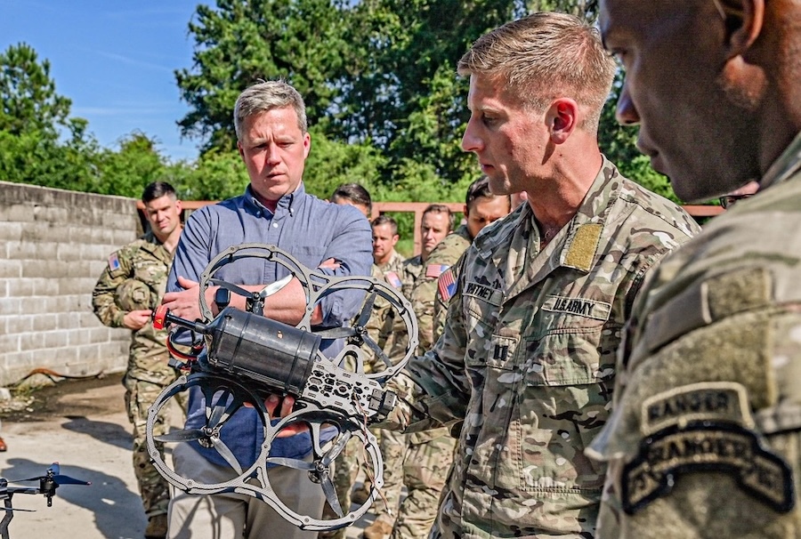 driscoll looking at a soldier holding a drone