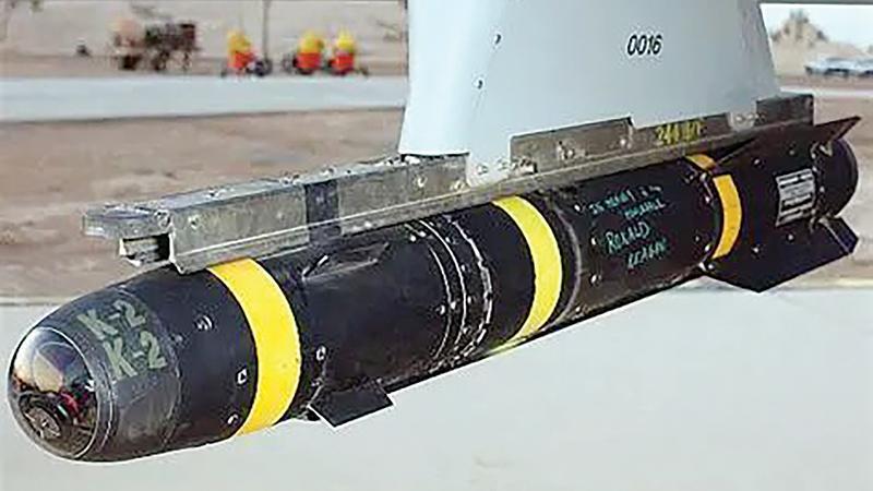 black missile with yellow bands
