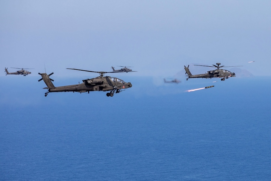 helicopter dropping missiles