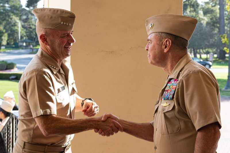 Kilby and Skalski shaking hands