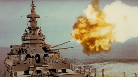 USS Iowa battleship firing guns