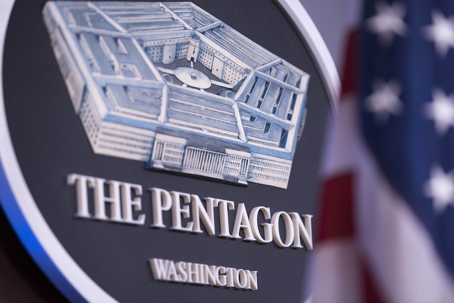 Pentagon seal with US flag in foreground