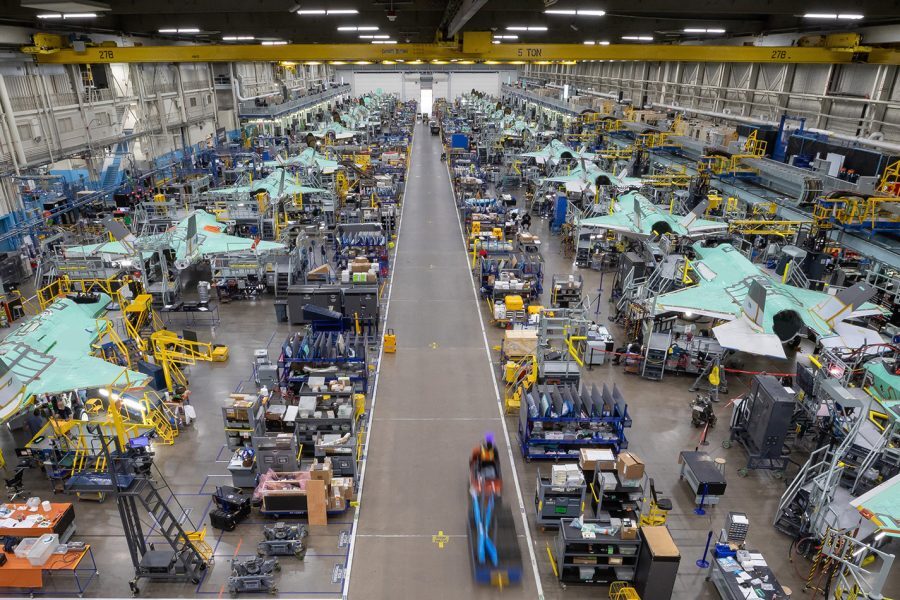  factory floor lined with aircraft
