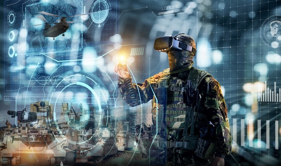soldier wears virtual reality glasses in front of a transparent computer screen, helicopters and tanks in background