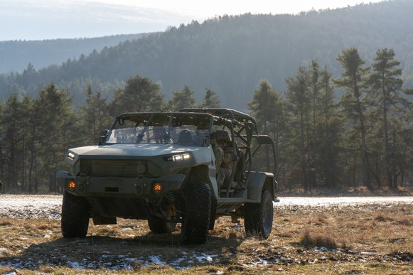 soldiers inside a tactical vehicle