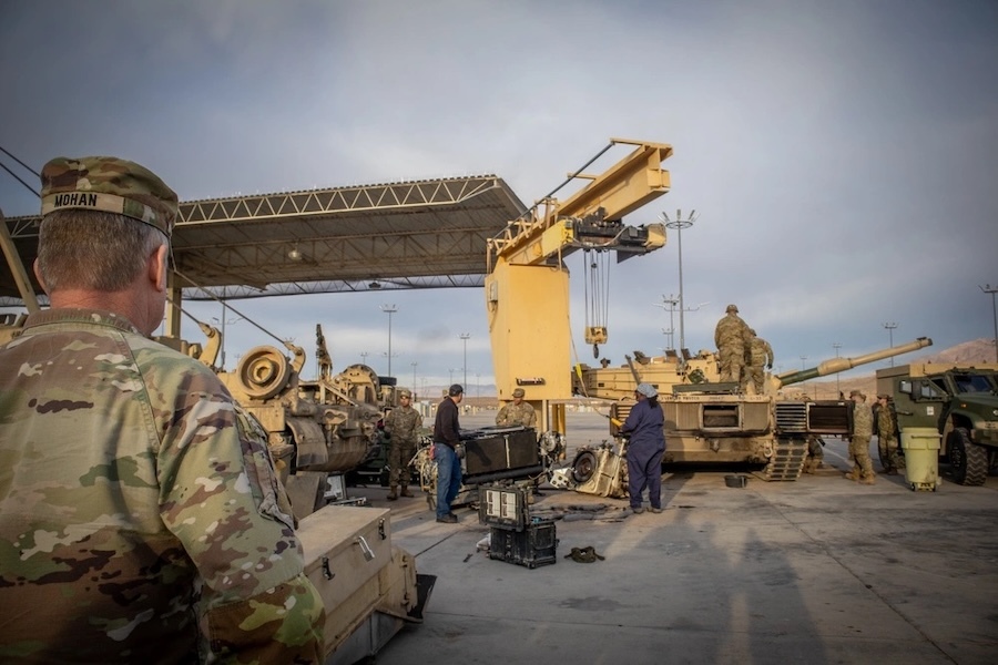 soldiers working with heavy equipment