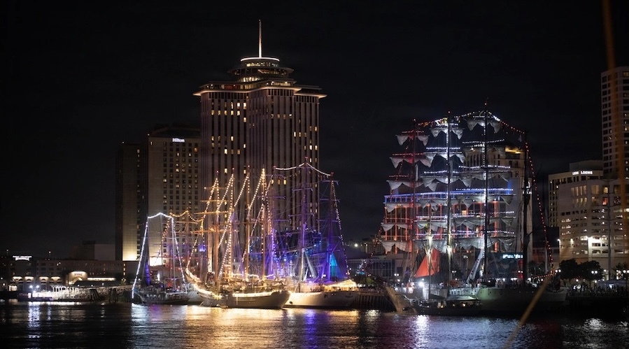 sailing ships on the Mississippi at night