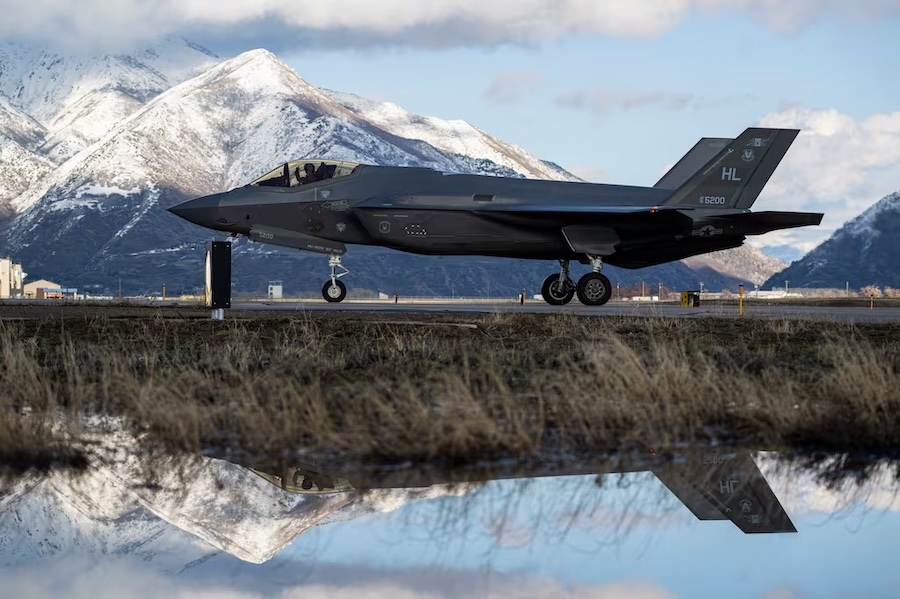 F-35A Lightning taxiing in front of snow-covered mountain