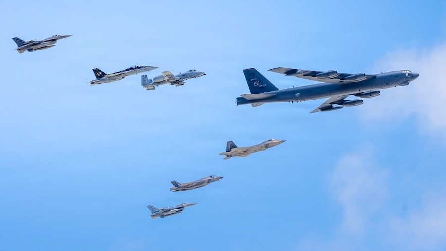 military planes fly in formation