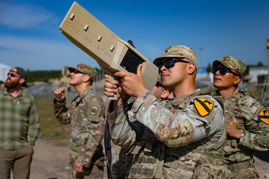 soldier aiming a counterdrone weapon