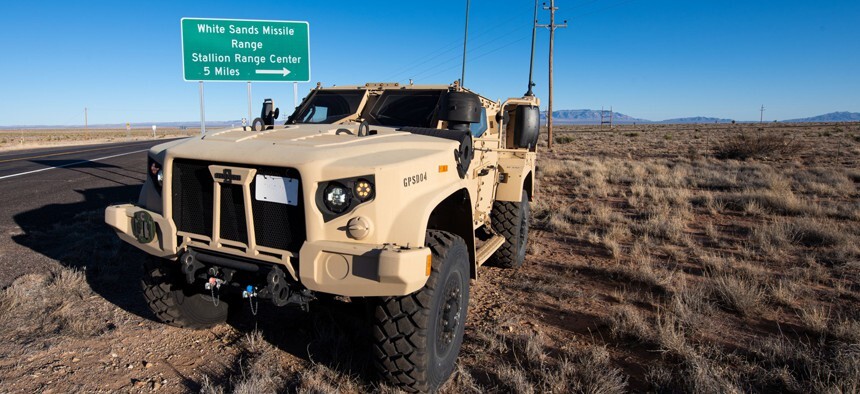 Army vehicle parked in front of a White Sands Missile Range