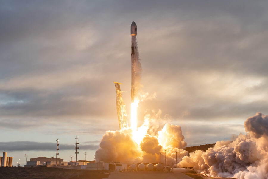 Rocket lifting off in a cloud of flame and smoke