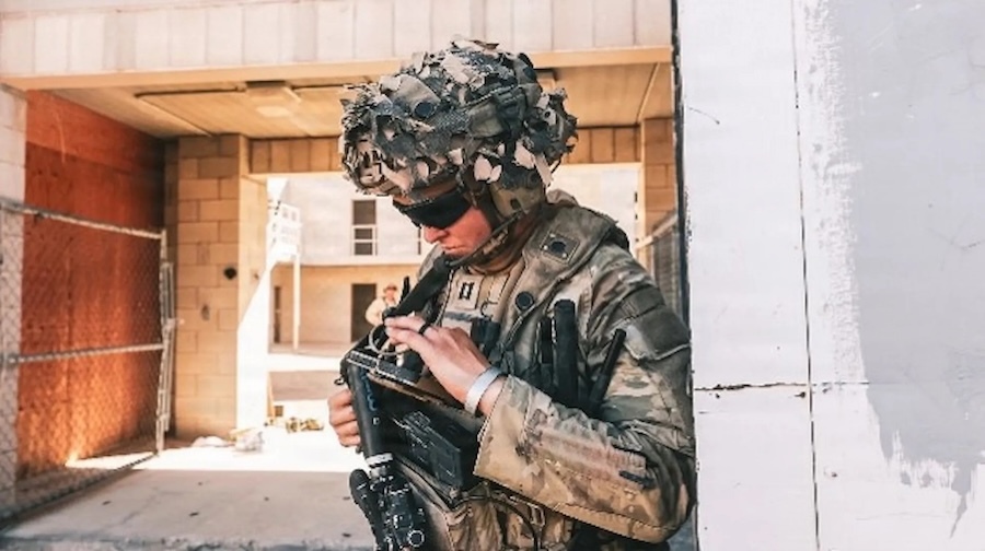 soldier using electronic communication device