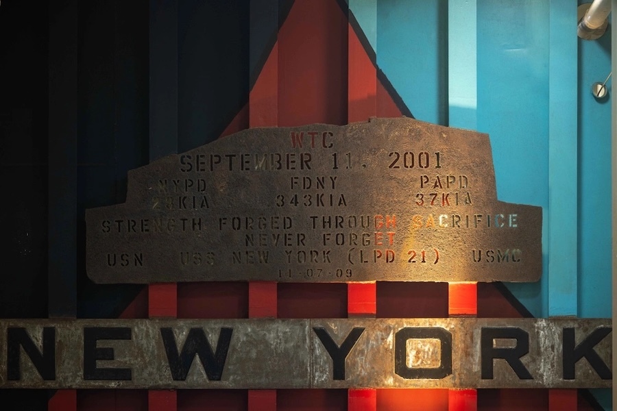 Plaque memorializing 9/11 hangs over the words NEW YORK