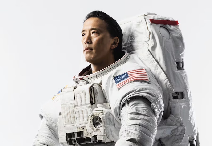Jonny Kim in white spacesuit