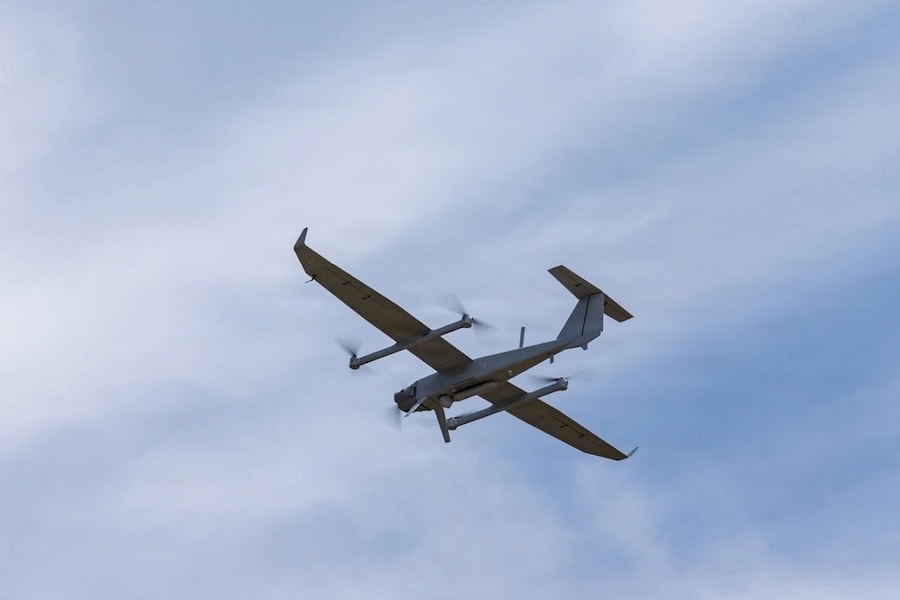 unmanned plane in a cloudy blue sky