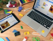 home learning exercises on a tablet and laptop