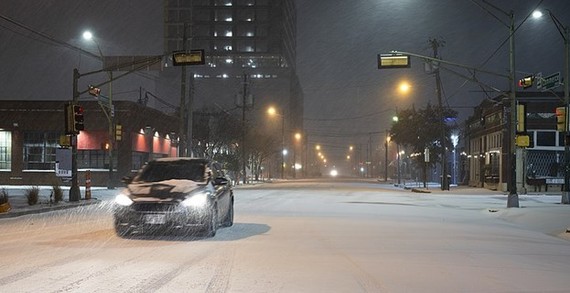 a car driving on a snowy road