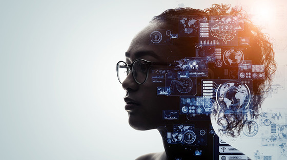 Silhouette of a woman's head with scientific diagrams superimposed on it. Credit: iStock/metamorworks