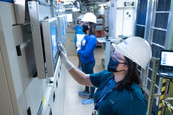 Women working in semiconductor manufacturing