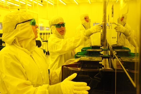Technicians in a clean room at the U.S. National Science Foundation’s Northeast Advanced Technological Education Center Credit: Daryl Marshke