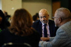 EDU staff engaging in discussion with researchers in Mississippi
