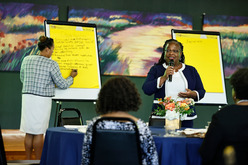 EDU staff engaging in discussion with researchers in Mississippi