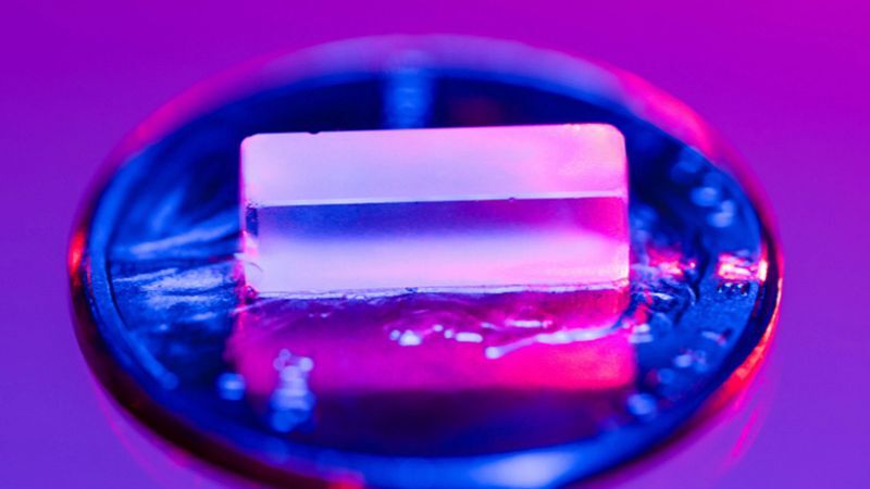 A purple flourine-rich crystal with thorium-229 atom trapped inside