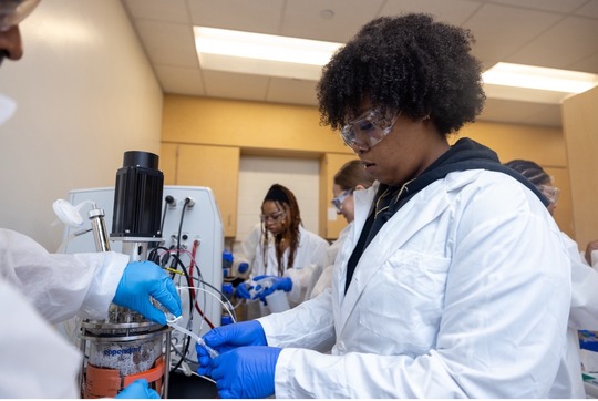 Fayetteville State University students train on lab equipment on campus. Hands-on science that powers FSU's recent soybean DNA research.