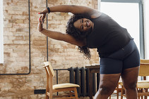 Image shows a Black/African American woman exercising