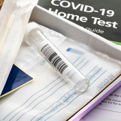 Image shows a COVID-19 home test kit 