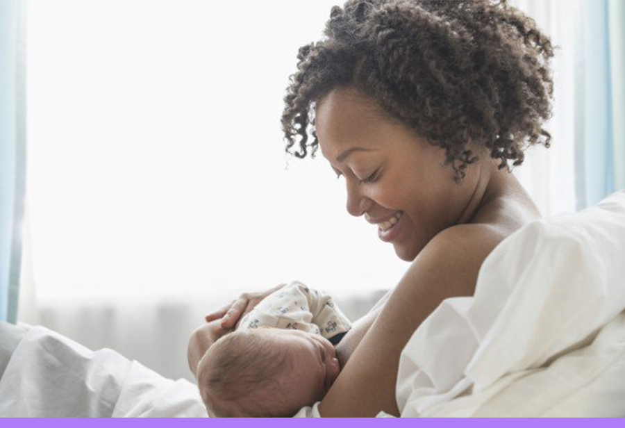 African American woman breastfeeding baby