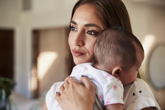 Mom holding son