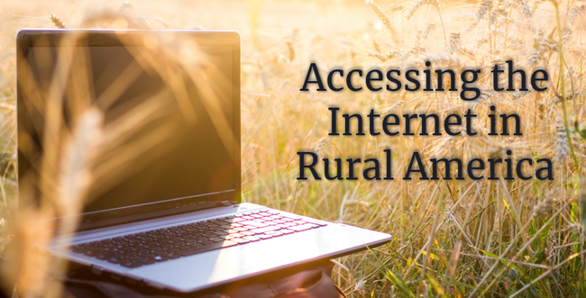 "Accessing the Internet in Rural America" Laptop shown sitting in field.