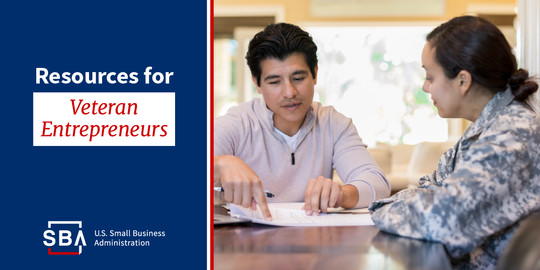 Photo of two people sitting at a table indoors with the following text, resources for veteran entrepreneurs. The SBA logo is at the bottom.