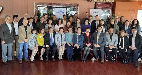 Asian American Pacific Islander small business owner with RA Mike Fong in group photo.