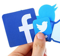 image of a hand holding twitter and facebook icons