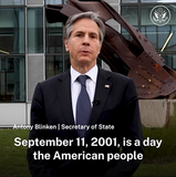 Secretary Blinken speaks in front of the World Trade Center Memorial at NATO Headquarters. 