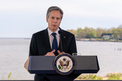 Secretary Blinken speaking with the Chesapeake Bay in the background.